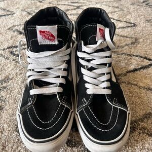 Vans Black and White High-Top Shoes